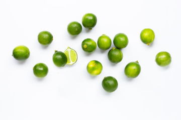 Fresh limes isolated on white background.