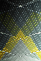 Obraz premium Computer graphics resembling architectural structure of panels. Abstract modern architecture background. Geometric pattern of parallel lines and angular or polygonal structure.