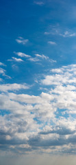 Fantastic clouds against blue sky, panorama