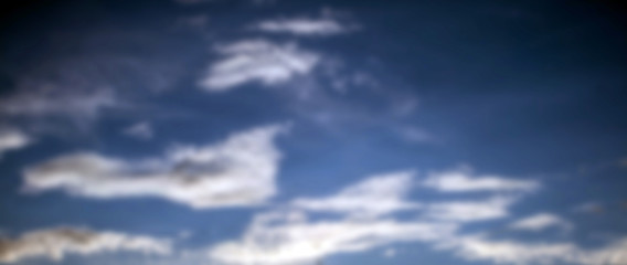 Naklejka na ściany i meble white clouds panorama blurred background