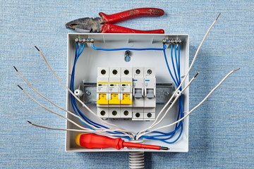 Installing of electric panel with automatic fuses.