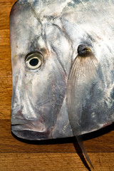 Fresh moonfish on a cutting board