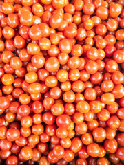 fresh small tomatoes at the market