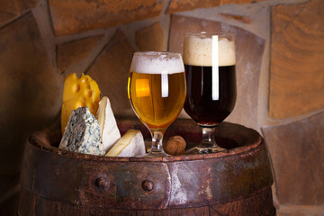 Light and dark beer accompanied with selection of cheeses