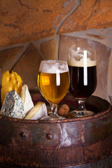 Light and dark beer accompanied with selection of cheeses