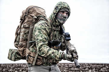 Portrait of modern army infantryman on march