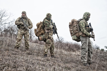 Fototapeta premium Military army soldiers team members patrolling area