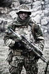 Army special forces veteran with service rifle