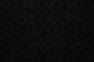 Beautiful black fabric with floral pattern and textile texture background