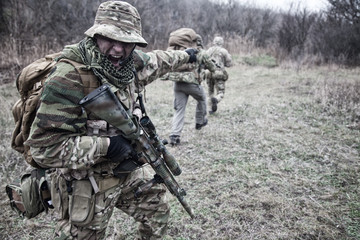 Commandos army soldier tactical group leader screaming orders