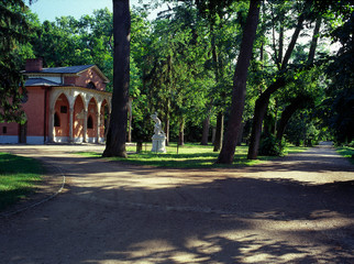 Fototapeta na wymiar Pulawy, lubelskie region, Poland - July 2010: park and The Gothic House in Pulawy