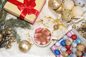 Christmas and New Year background with gift boxes, cocoa and Christmas decorations, top view, flet lay. New Year card for congratulations, selective focus, festive atmosphere © Светлана Балынь