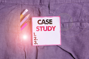 Writing note showing Case Study. Business concept for research methodology that has commonly used in social sciences Writing equipment and blue note paper in pocket of trousers