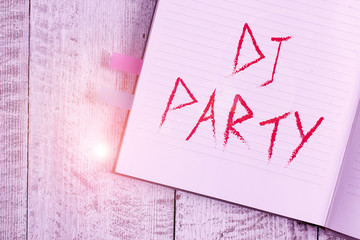 Writing note showing Dj Party. Business concept for demonstrating who introduces and plays recorded popular music on radio Notebook stationary placed above classic wooden backdrop