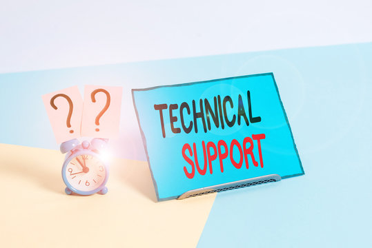 Writing note showing Technical Support. Business concept for service provided by a hardware or software company Alarm clock beside a Paper sheet placed on pastel backdrop