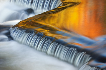 Autumn, Bond Falls Cascade Illuminated by Reflected Color from Sunlit Maples