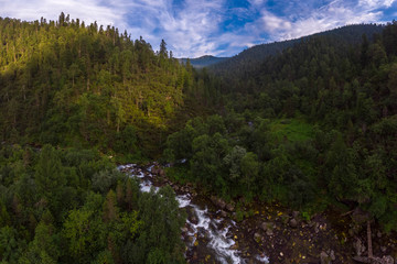 Top view of the mountain river in the Siberian forest