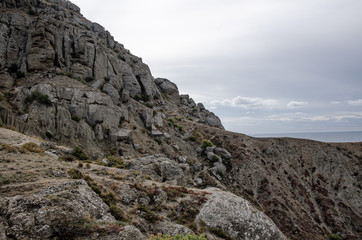  Mountain landscape, cliff and sky. Tourism and travel.