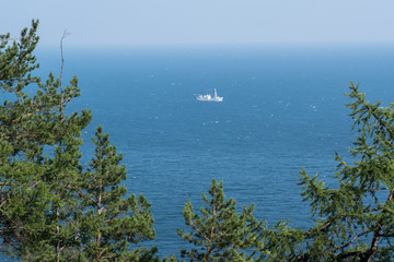 White ship sailing on Lake Baikal