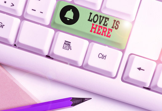 Handwriting text writing Love Is Here. Conceptual photo Roanalysistic feeling Lovely emotion Positive Expression Care Joy