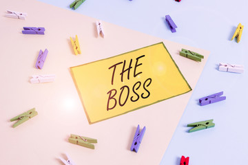 Word writing text The Boss. Business photo showcasing a demonstrating who exercises control or authority in the organization Colored clothespin paper empty reminder yellow blue floor background office