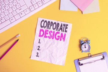 Text sign showing Corporate Design. Business photo text official graphical design of the logo and name of a company Copy space on notebook above yellow background with keyboard on table