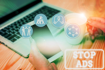 Handwriting text Stop Ads. Conceptual photo program that will remove different kinds of advertising...