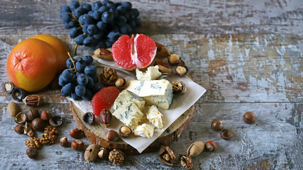 Blue cheese with nuts and fruits. Cheese appetizer. Keto diet. Keto Set