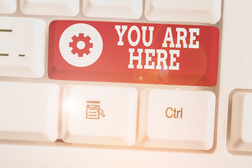 Text sign showing You Are Here. Business photo showcasing This is your location reference point...