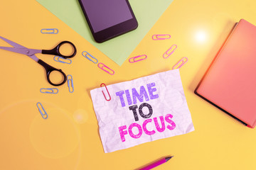 Text sign showing Time To Focus. Business photo text Give full attention to something or activity Key to success Paper sheets pencil clips smartphone scissors notebook colored background