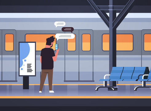 rear view man standing on platform using chatting mobile app on smartphone social network chat bubble communication concept train subway or railway station full length horizontal vector illustration
