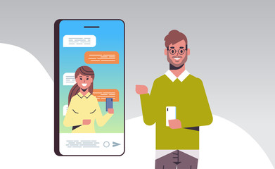 man using smartphone online conference video call with female colleague social network communication concept mobile application horizontal portrait vector illustration