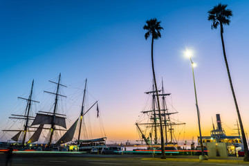 Evening sunset/ morning sunrise street view by the harbor waterfront in downtown San Diego,...