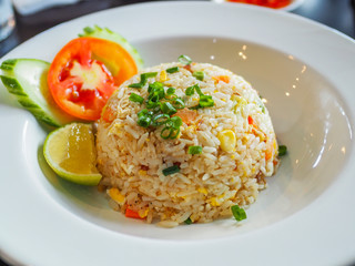 Crab fried rice on a white plate