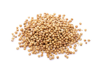Coriander seeds on white background