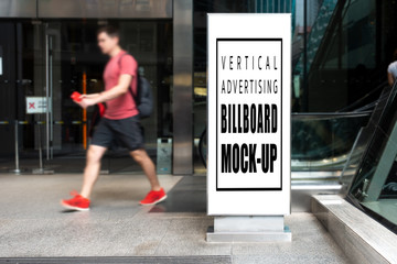 Mock up blank vertical billboard in airport area