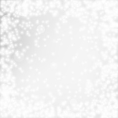 Abstract colorful bokeh and glowing spakling shining particles in random blue color theme background. Lighting effects of flash. Blurred vector background with light glare,