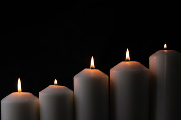 Five light flame candle burning brightly