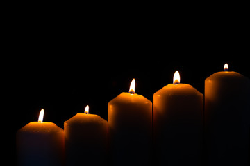 Five light flame candle burning brightly