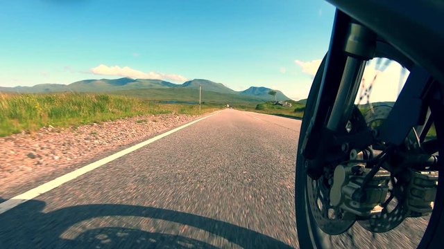 Motorcycle on the open roads in Glencoe Scotland
