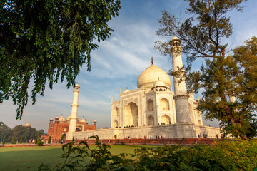 Sunrise at the wonderful Taj Mahal, in Agra, one of the seven world wonder. Giant mausoleum made of marble.