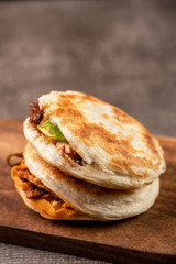 chinese hamburger in black plate