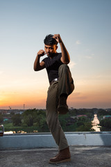 Fototapeta premium man posing mauy thai in rooftop