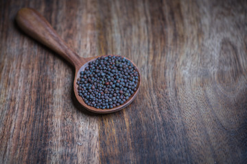 wooden spoon with poppy seeds