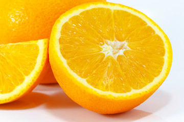 Sliced Fresh Orange Fruit isolated on white background.