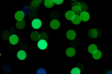 Garland lights on the Christmas tree. Blurred defocused christmas background for design.