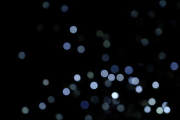  Garland lights on the Christmas tree. Blurred defocused christmas background for design.