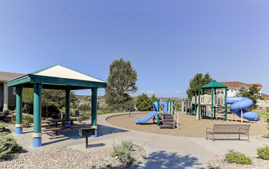 Community playground under a clear sky