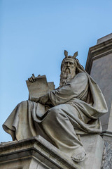 A statue of the Old Testament Moses with the tablets of the covenant in his hands. Italy. Rome, Vatican.