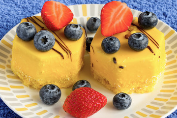 Tasty cakes with fresh berries for dessert
